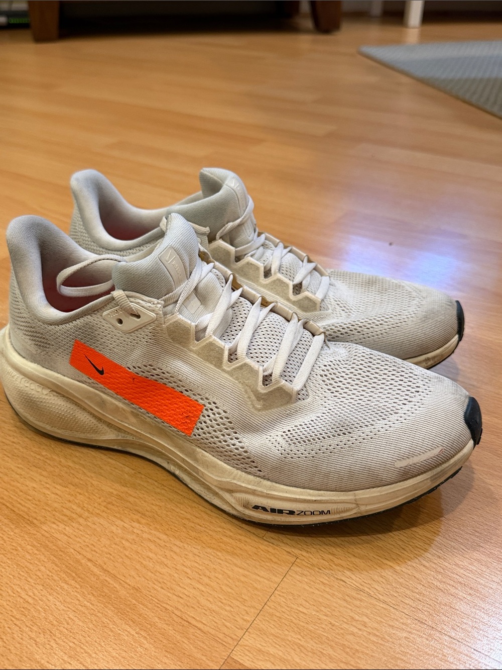Nike AIR ZOOM Men’s White Athletic Running Shoes with Orange Accent